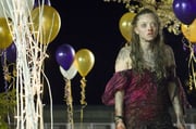 Amanda Seyfried como Anita em Garota Infernal