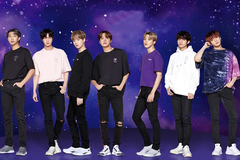 Integrantes do grupo BTS em campanha da Fila