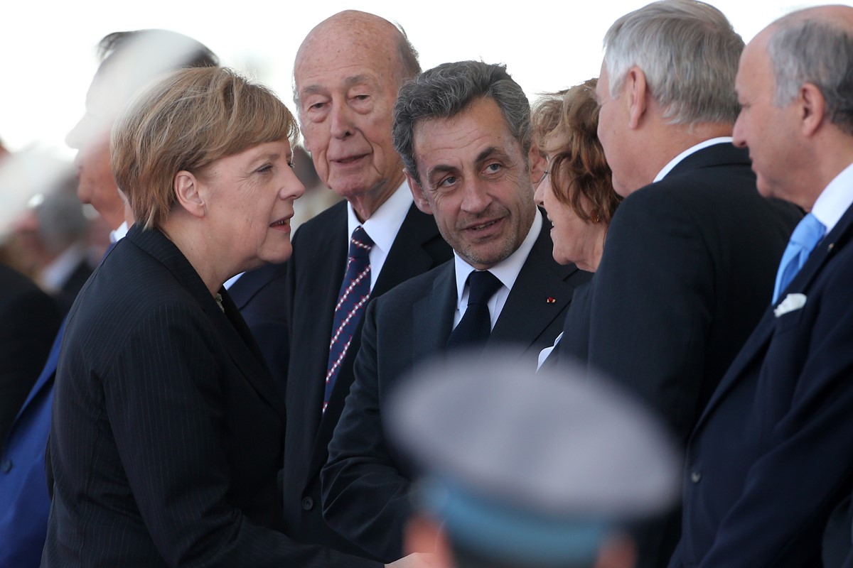 Angela Merkel, Valéry Giscard d'Estaing e Nicolas Sarkozy 