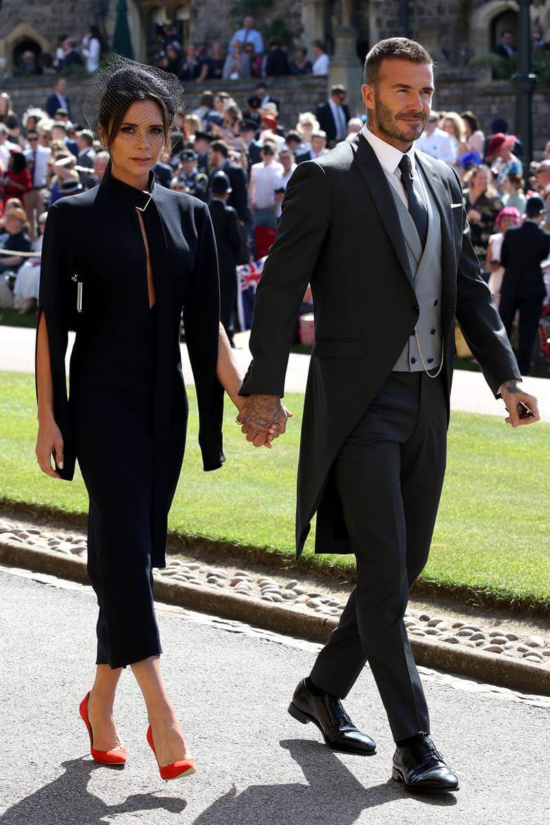 Foto colorida de Victoria e David Beckham no casamento de Meghan e Harry - Metrópoles