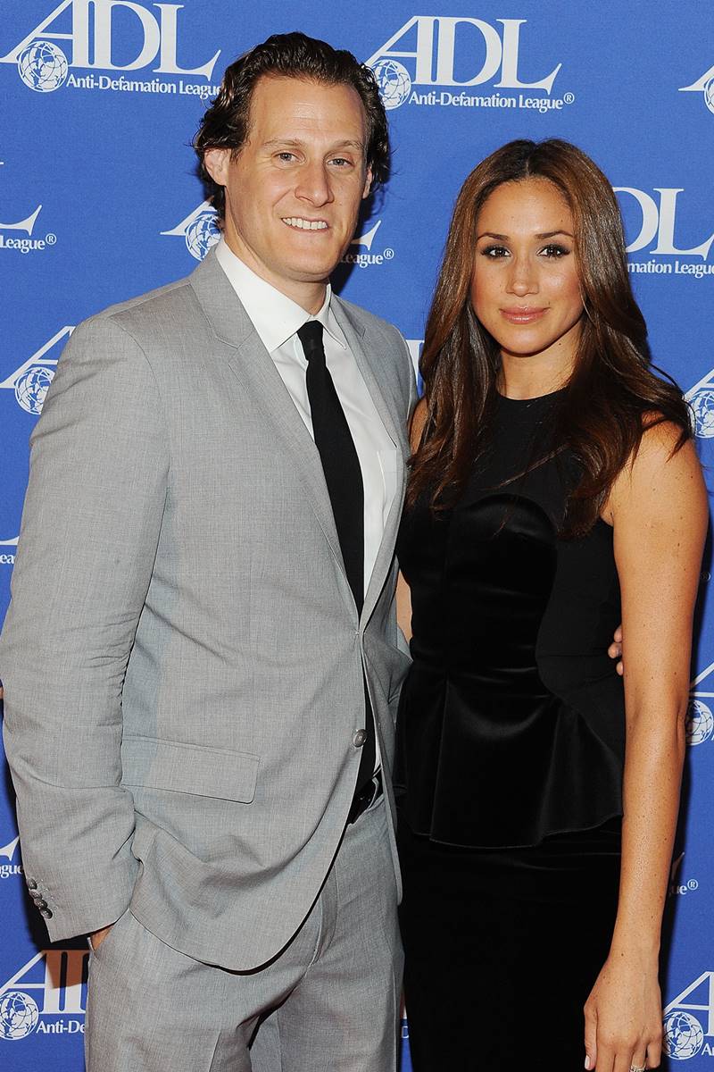 Trevor Engelson e Meghan Markle