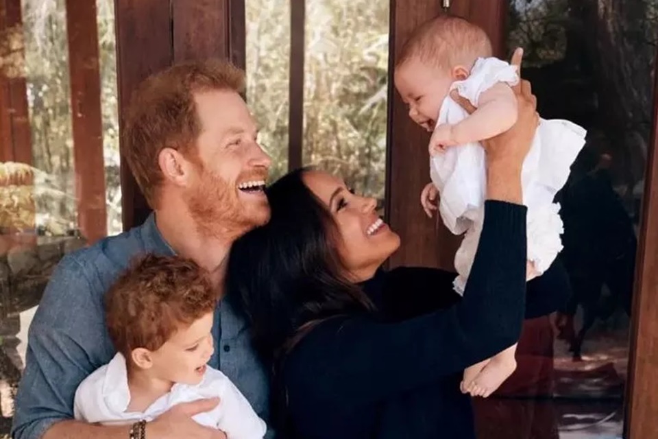 Color image.  Prince Harry, Archie, Meghan Markle and Libertine Diana