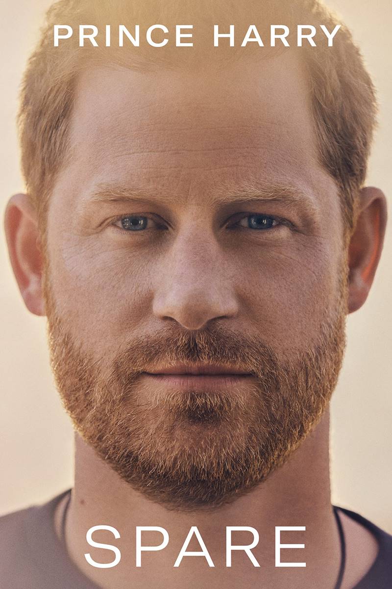 Foto colorida de capa de livro que traz foto de homem branco e ruivo. Na imagem está escrito Prince Harry e Spare - Metrópoles