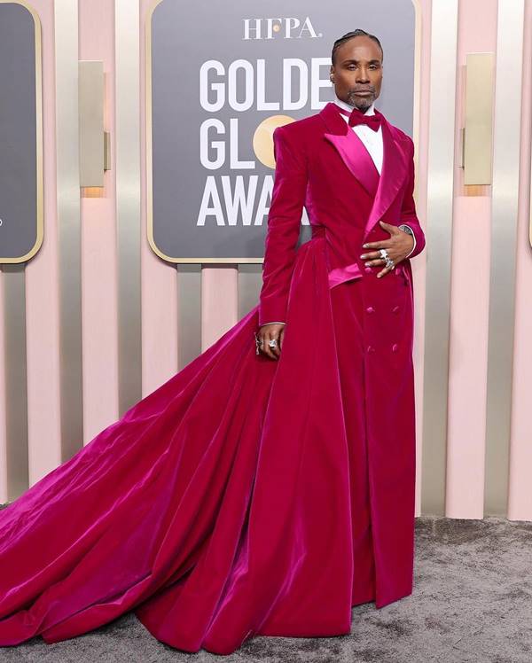 Billy Porter usa vestido volumoso rosa combinado com gravata borboleta - Metrópoles