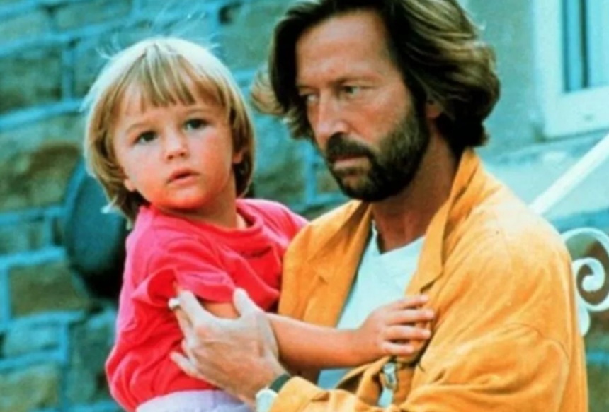 Imagem colorida de eric clapton com o filho