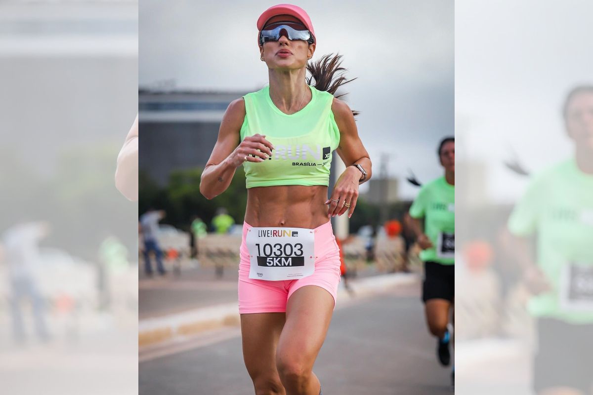 Foto colorida de uma mulher com roupa de esporte - Metrópoles