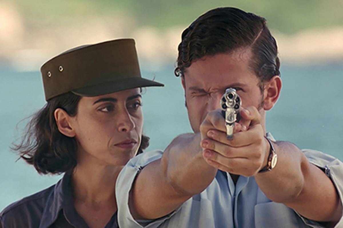 Foto colorida de Fernanda Torres e Selton Mello no filme O que É Isso Companheiro - Metrópoles