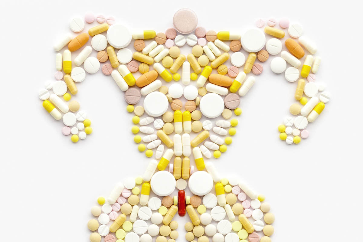 Drogas antidoping e hormônios esteróides na forma de um fisiculturista musculoso. Anabolizante esteroide vitamina suplemento oxandrolona dianabol