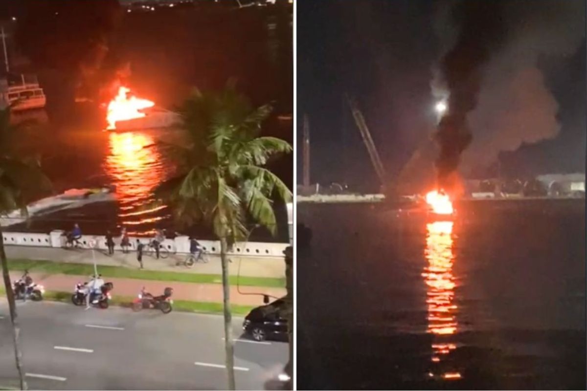 Embarcação com 2 pessoas pega fogo no mar de Santos, litoral de SP