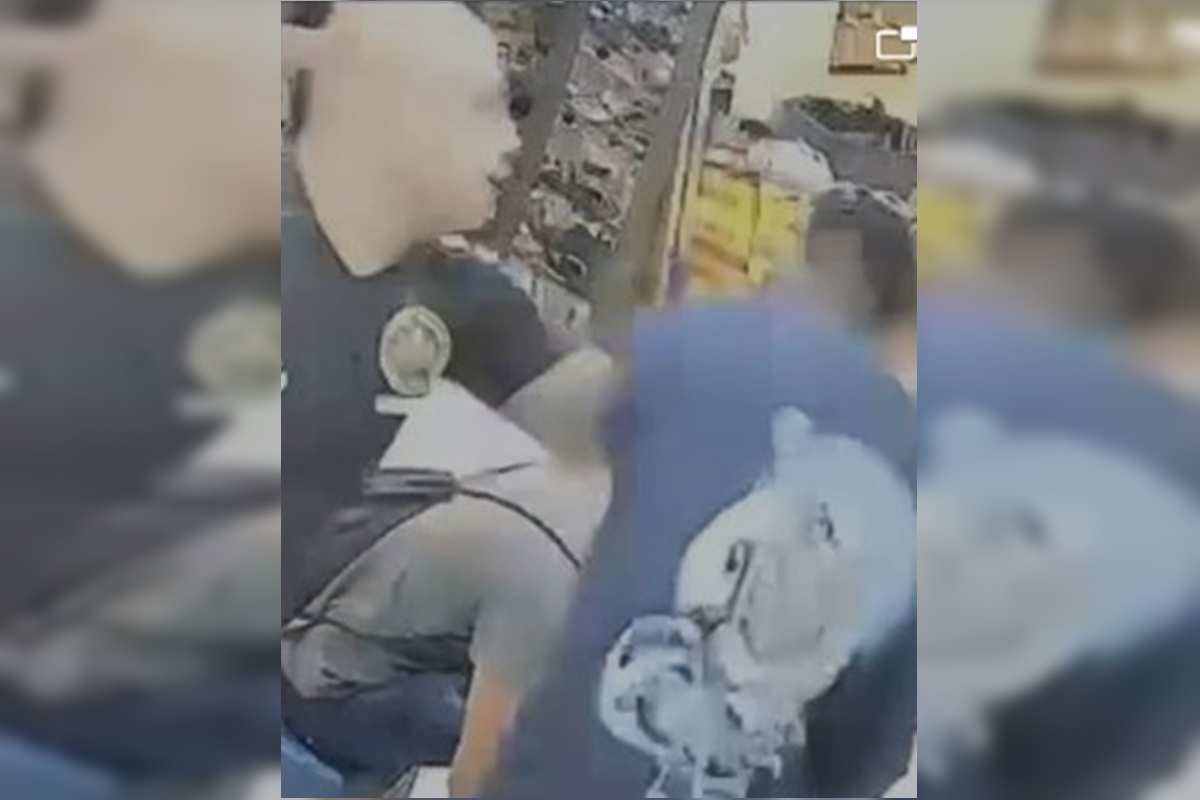 Policial militar agride vendedor com socos na Feira dos Goianos. Vídeo