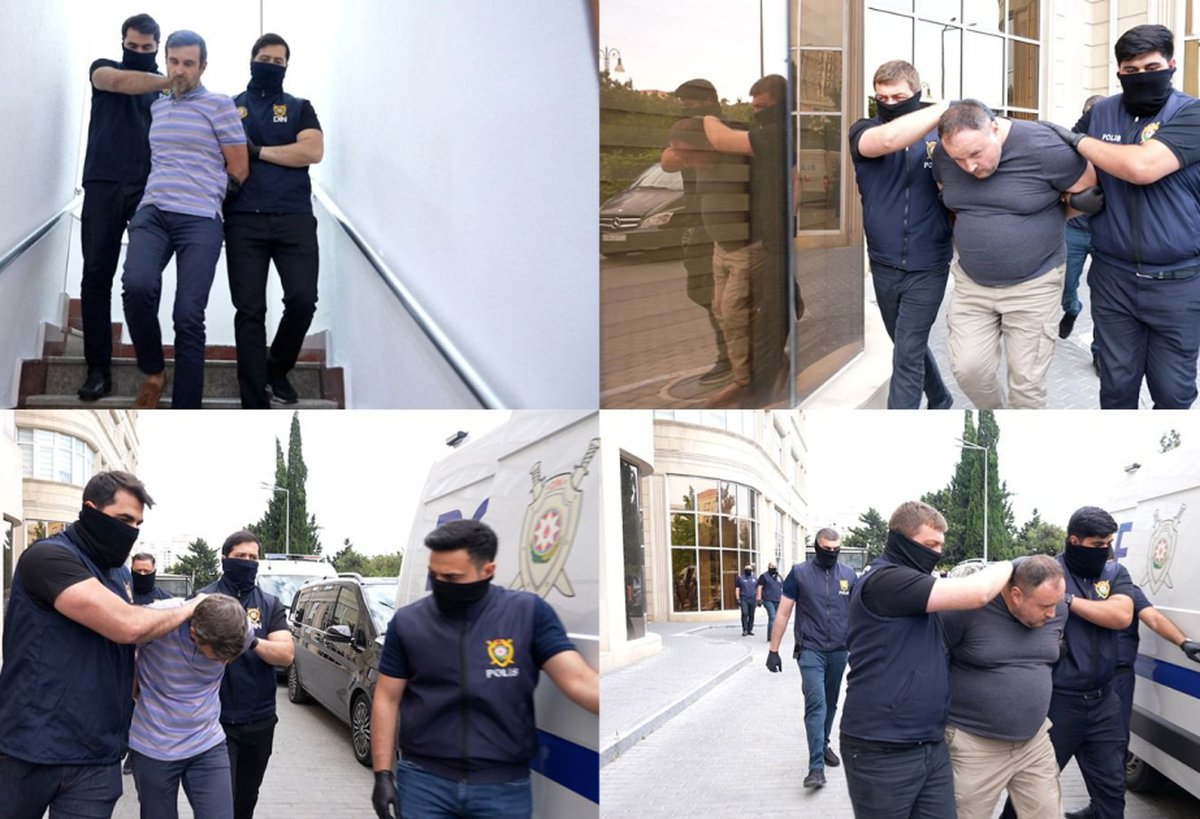 Imagem colorida mostra jornalistas russos presos no Azerbaijão - Metrópoles